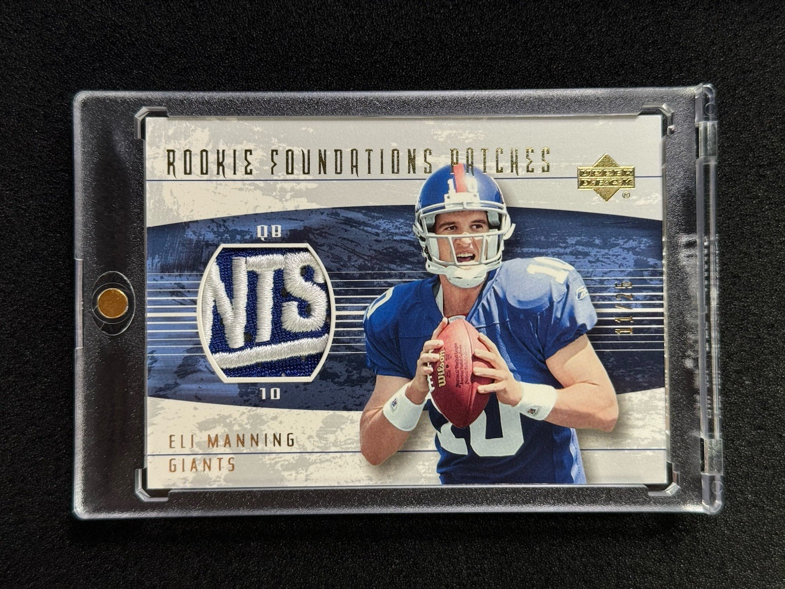 ELI MANNING 2004 UPPER DECK #/25 ROOKIE FOUNDATIONS PATCH Gold Giants Logo Worn