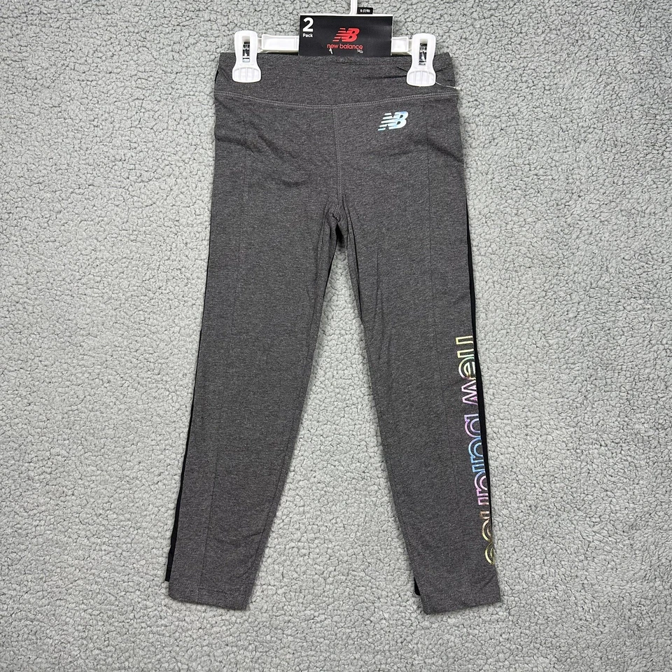 New Balance Pantalones Niñas Pequeños 7/8 Leggings Atléticos Paquete de 2 Negro Gris Arco Iris Foto 3 de 4