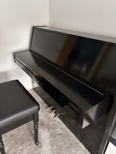 Black Eavestaff upright piano