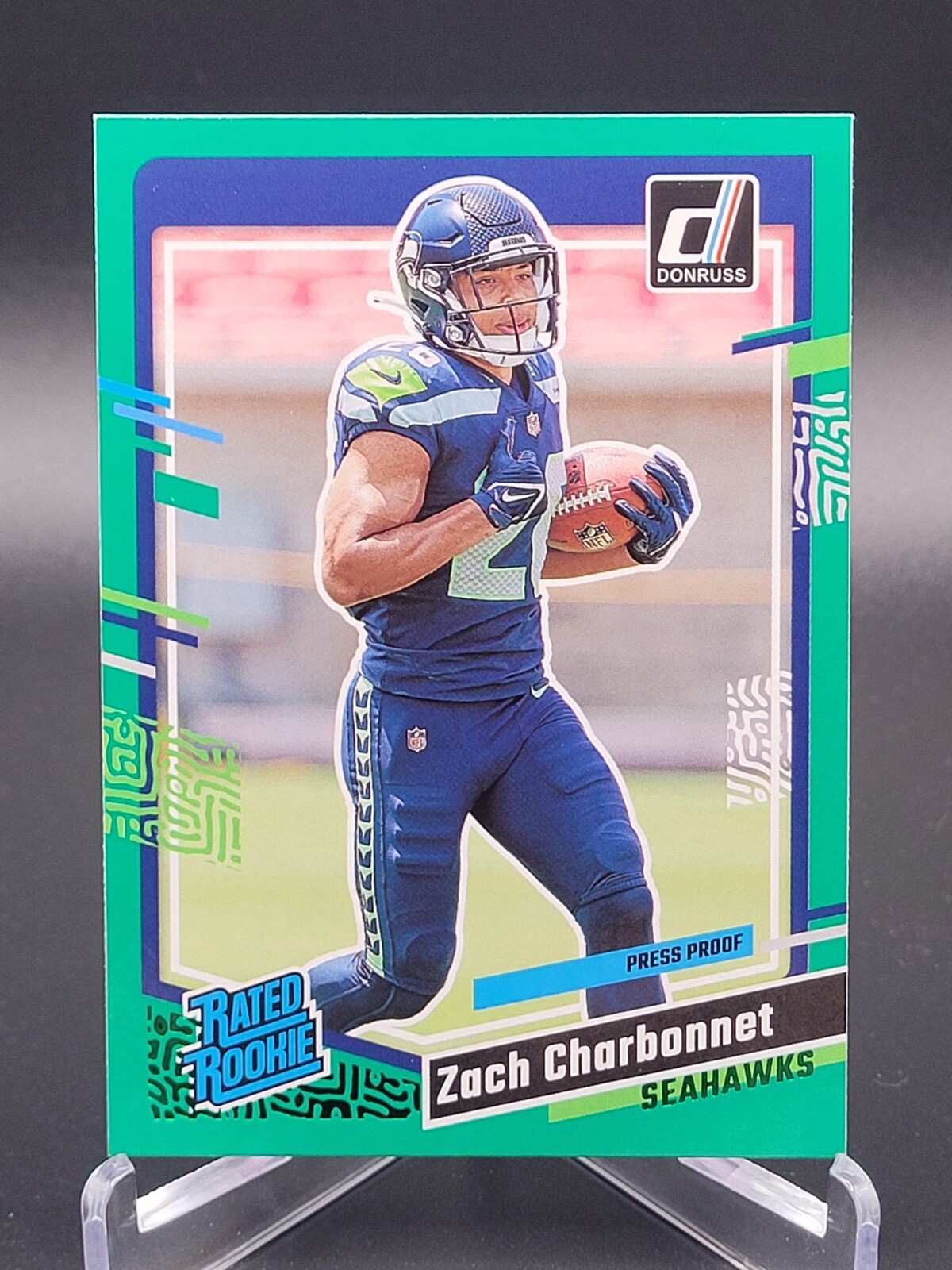 2023 Donruss Zach Charbonnet Rated Rookie Press Proof Green No. 392