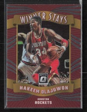 2023-24 Donruss Optic #12 Hakeem Olajuwon Winner Stays Houston Rockets