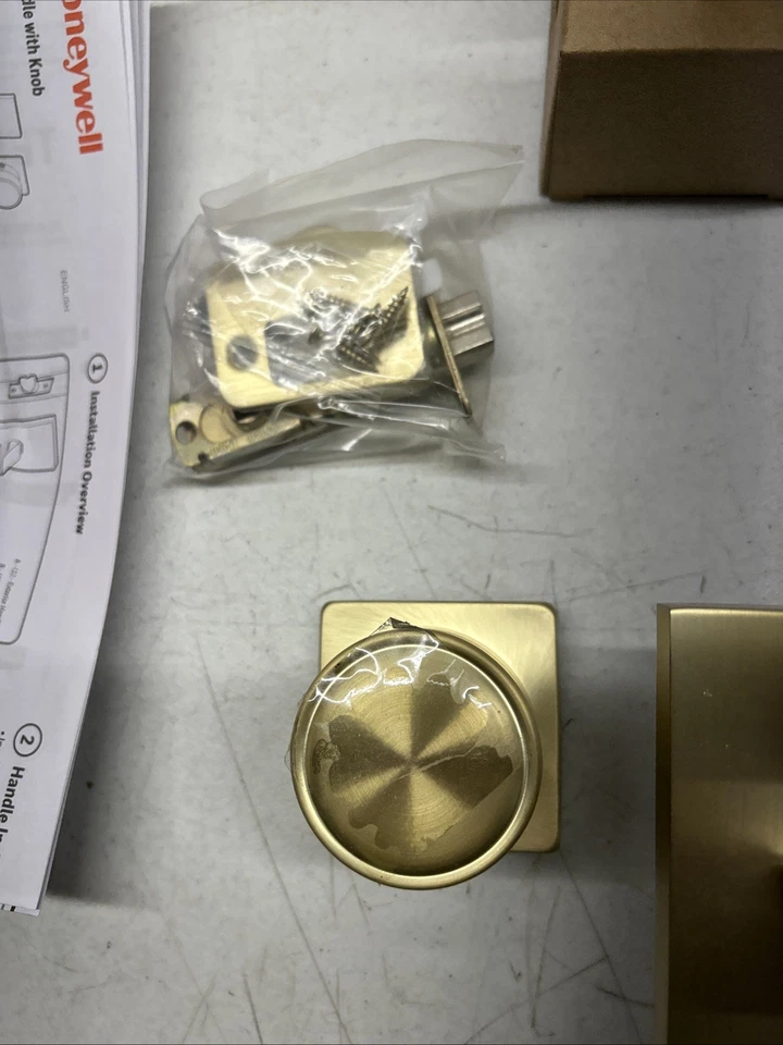 Manija de puerta de entrada interior/exterior oro satinado Honeywell 8120007 Foto 2 de 4