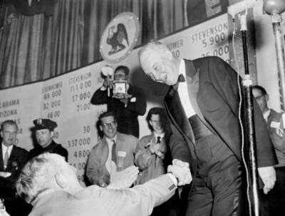 Dwight D Eisenhower shakes hands with his chauffeur Eddie Halpern  .. Old Photo