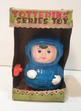 Vintage Japan windup Robot Astronaut Tottering Series