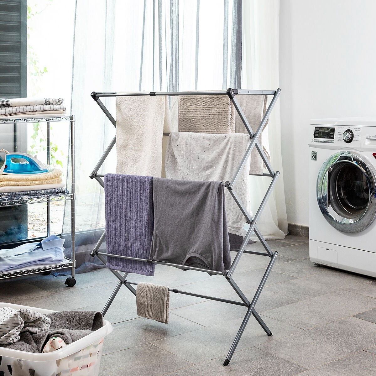 Séche linge pliable en métal pour optimiser l'espace des petits appartements