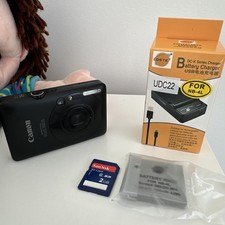 Canon IXUS 100 Is Compact Digital Camera Black With new battery and Charger