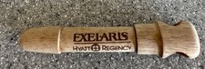 Vintage wooden HYATT REGENCY Exelaris wine cork puller