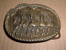 Belt Buckle shows scene of Horses
