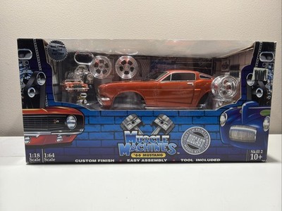 MUSCLE MACHINES 66 MUSTANG BUILD IT ORANGE BLACK STRIP DIECAST 1