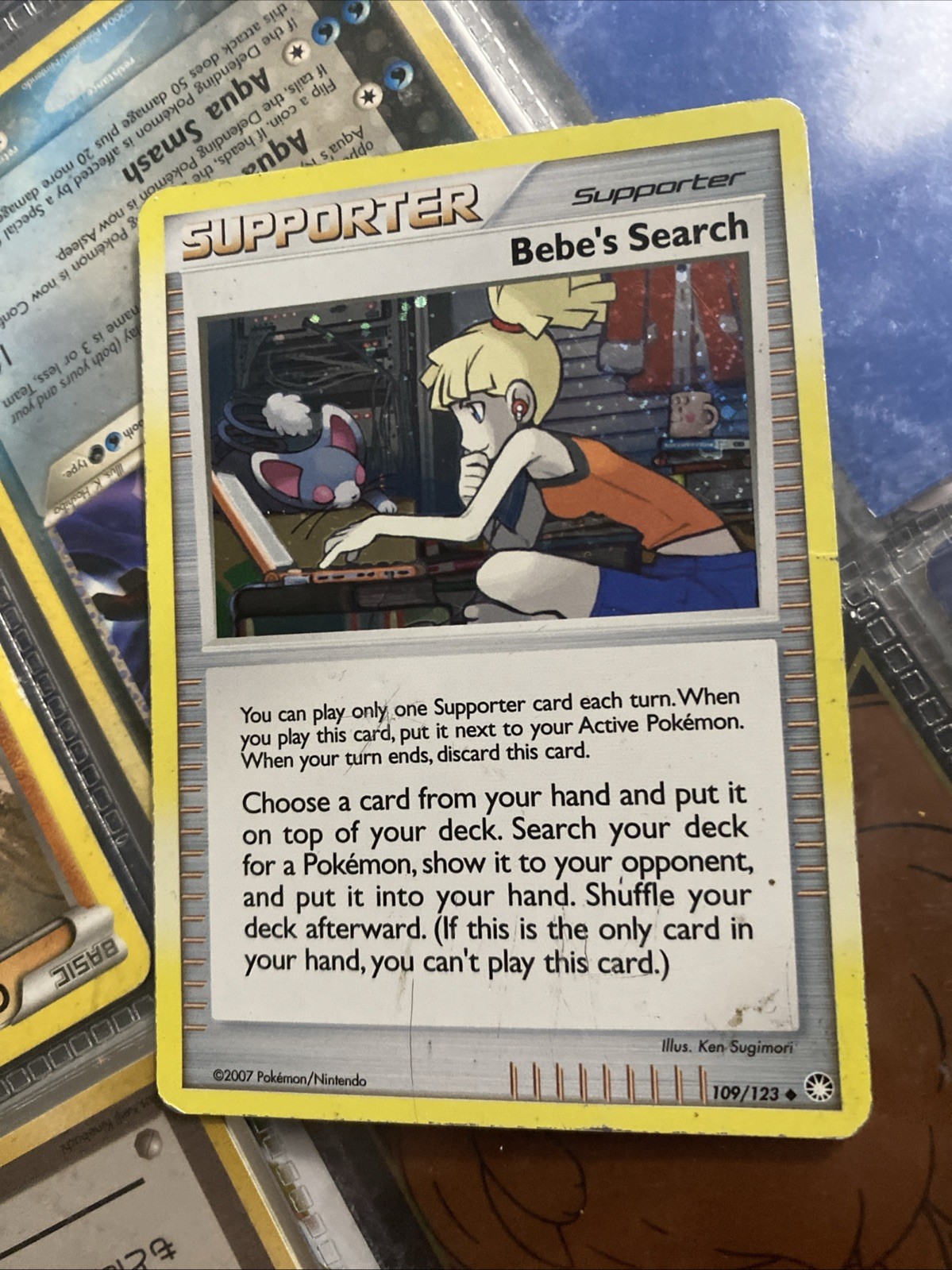 Bebe’s Search 109/123 Cosmos Holo Pokémon Card TCG Mysterious Treasures NM