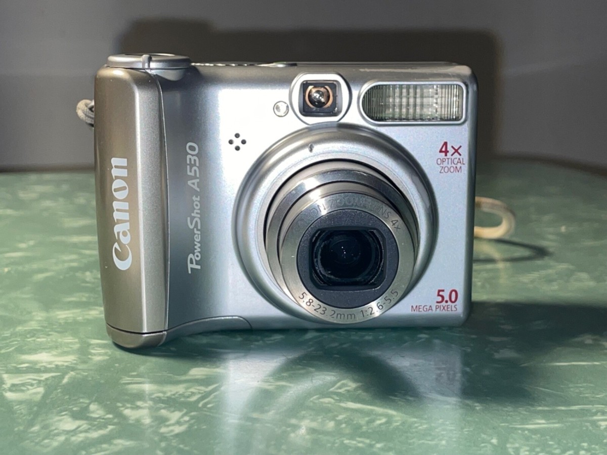 Canon Power Shot A530 Camera -Great- Working-Uses 2 AA Canon Power Shot A530 Camera -Great- Working-Uses 2 AA