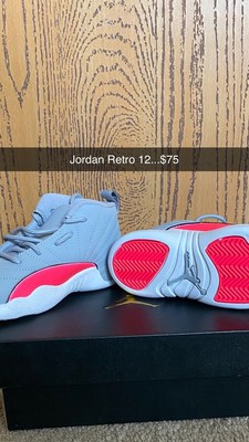 gray and pink jordan 12