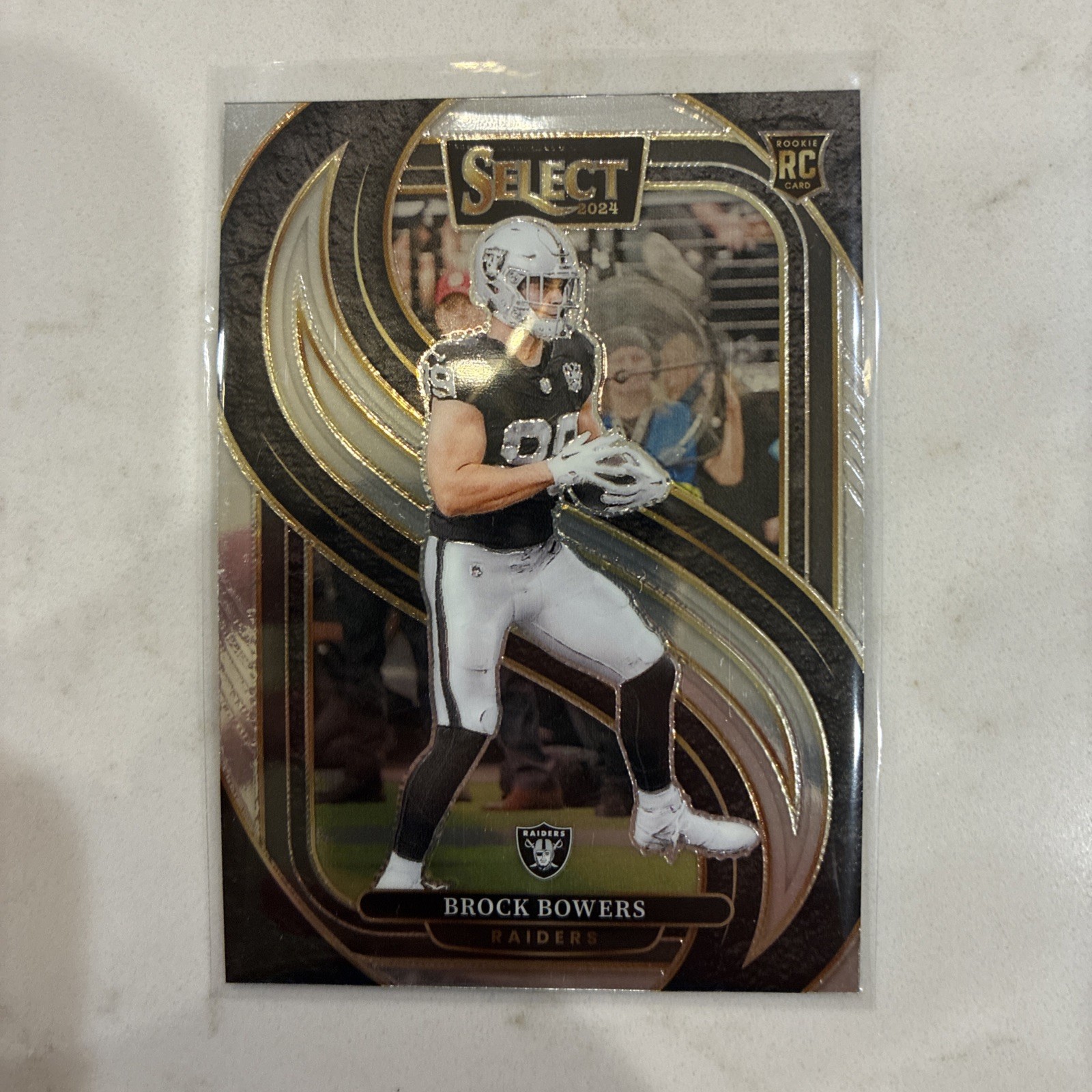 2024 Panini Select - Premier Level Brock Bowers #118 Silver Prizm (RC)