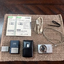 Canon PowerShot Digital ELPH SD850 IS Bundle Charger, Case, 2 Batteries Works!