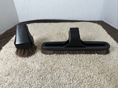 Vacuum attachments 10 inch brush and 3 round brush, have no markings on them