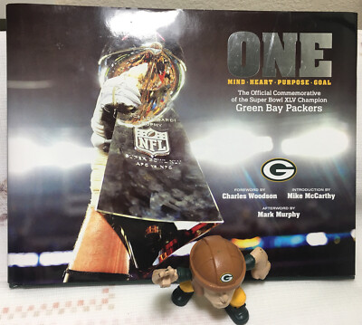 ONE: THE OFFICIAL COMMEMORATIVE OF THE SUPER BOWL XLV Free McDonald s Figure
