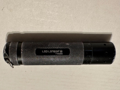 LED LENSER (1726390) Mini Led light. on/off switch inop. Use 3 AAA batt not incl