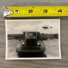 Vintage Black and White U.S. Mail Truck on Army Base Photo
