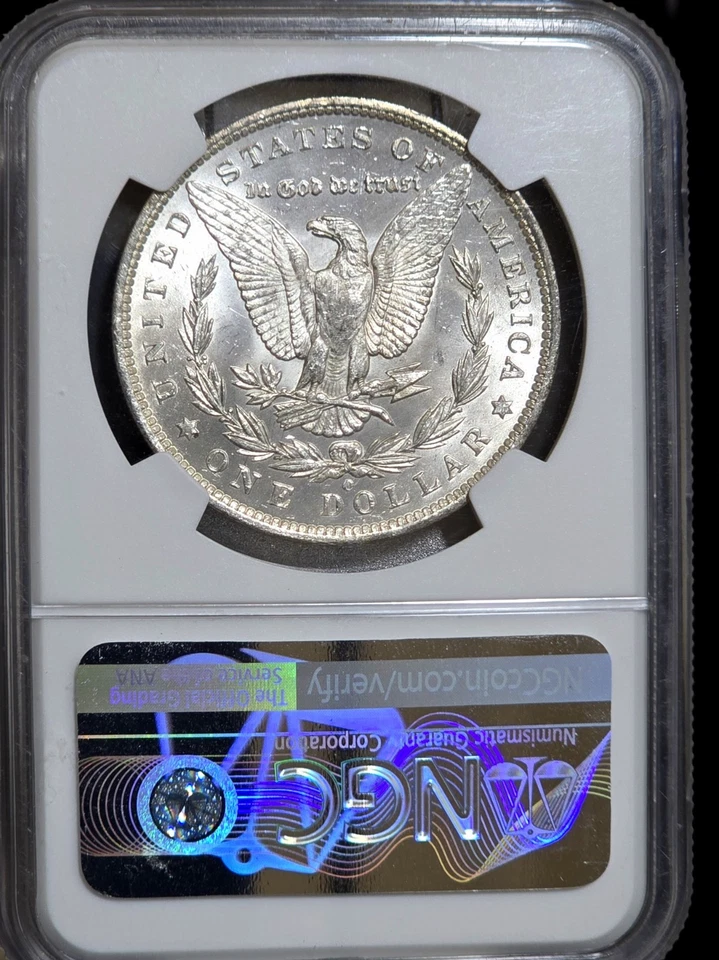 1885-O Morgan Silver Dollar NGC MS64 Rainbow Textile Tab Toned Coin Great Luster - Image 3 of 4