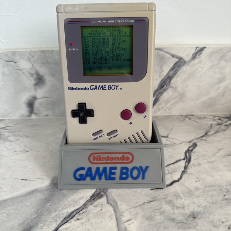 Original Nintendo Game Boy DMG-01 with a multi cart Pokemon games