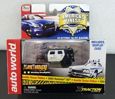 Auto World FLAMETHROWERS '04 HUMMER H2 Austin Police AMERICAS FINEST HO Slot Car