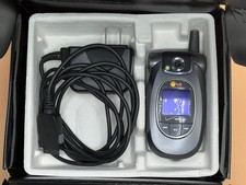 OEM Verizon Wireless LG VX8300 V Cast Music Flip Phone  Charger W Box CD Manual