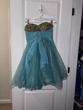 Junior’s Elegant Blue Dress with Gold Accents Size: 2