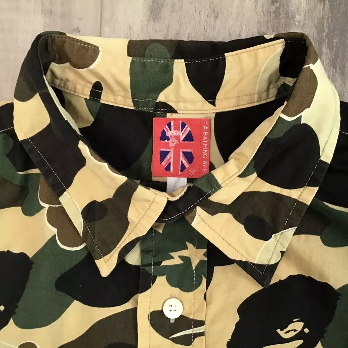 BAPE × kaws bendy 1st camo yellow Short sleeve shirt A Bathing Ape