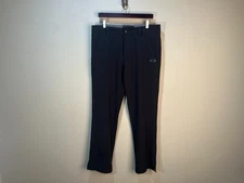 Oakley Golf Men's jet black flat front Tech chino Pants 34 X 32 EUC