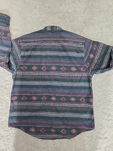 Gray LL Bean men’s flannel shirt with multicolor diamond pattern on back, short sleeves, and button-down front.