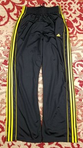 adidas track pants gold stripes