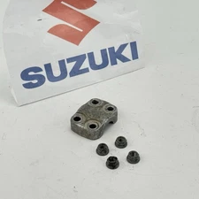 1992 Suzuki RM 125 right Fork Axle Holder Cap 51132-27C40