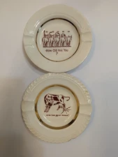VTG Lot Of 2 Humorous Cow Graphic Ceramic Ashtrays