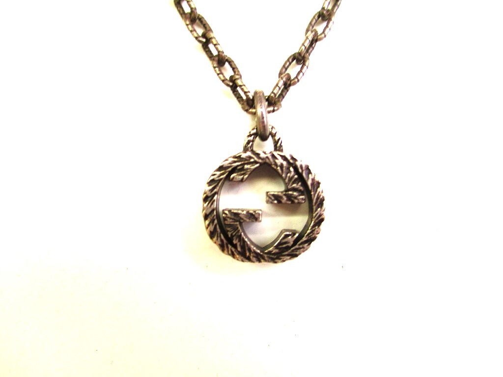 Authentic GUCCI Sterling Silver Interlocking G Pendant