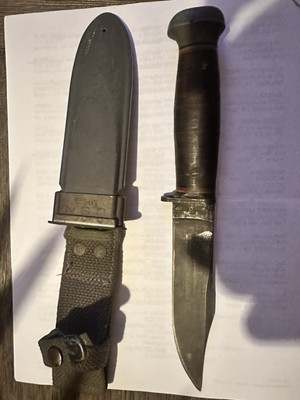 The knife in the image is a U.S. Navy Mark 1 (Mk 1) utility/fighting knife from