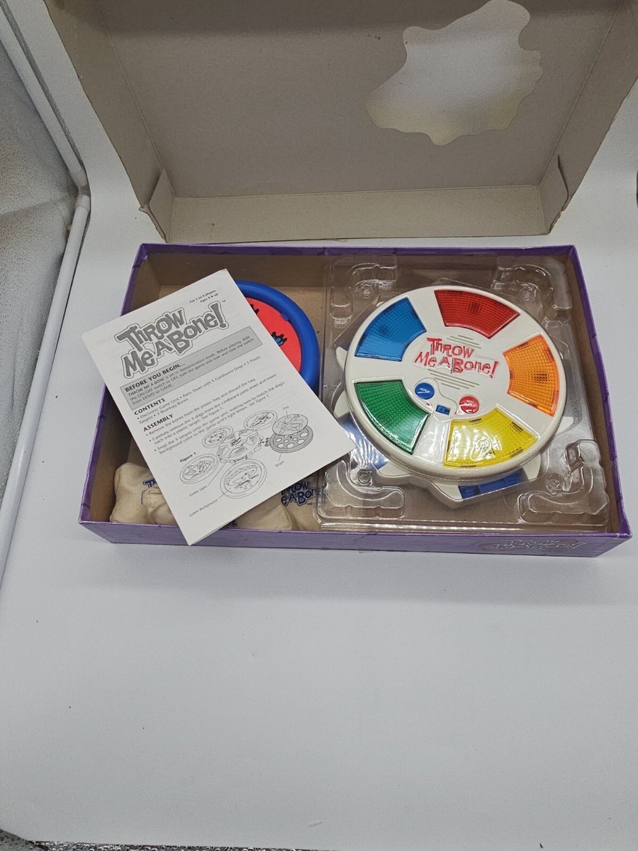Throw Me a Bone; Bone-Tossing Target Game (Milton Bradley; 2001