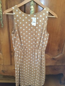 tan and white polka dot dress