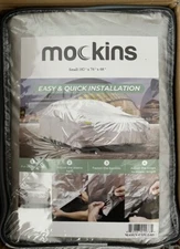 Mockins Car Cover: Small.  182 x 74 x 68. New. Zippered pack and original box. 