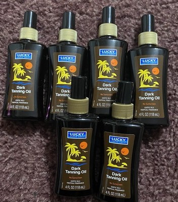6 BTLS . Dark tanning exotic oils, tropical fragrance 4oz. Each