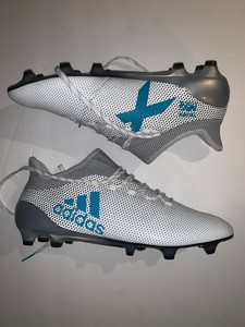 blue and white soccer shoes