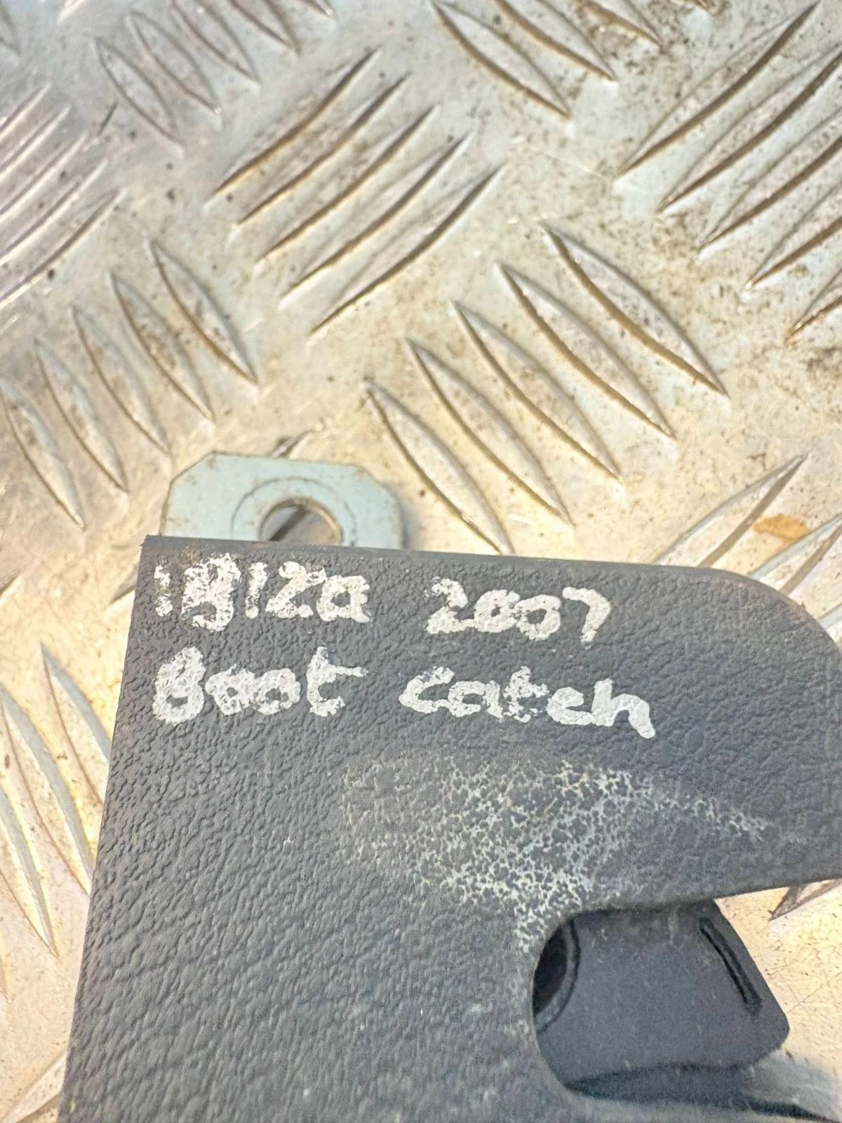 Close-up donor marking on the exact boot catch