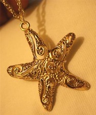 Lovely Lacy Sculpted Openwork Swirled Star Starfish Goldtone Pendant Necklace