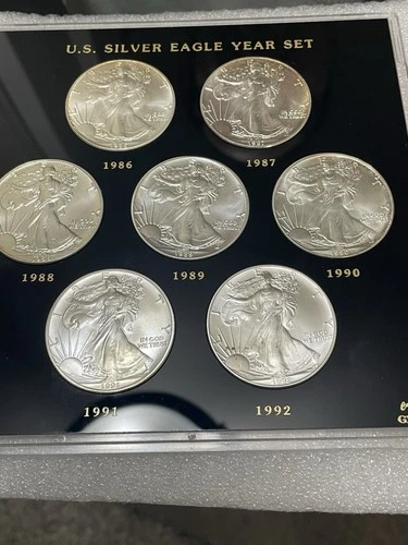 Set 1986-1992 American Silver Eagle 7 Troy Oz .999 Fine Silver, Plastic Holder