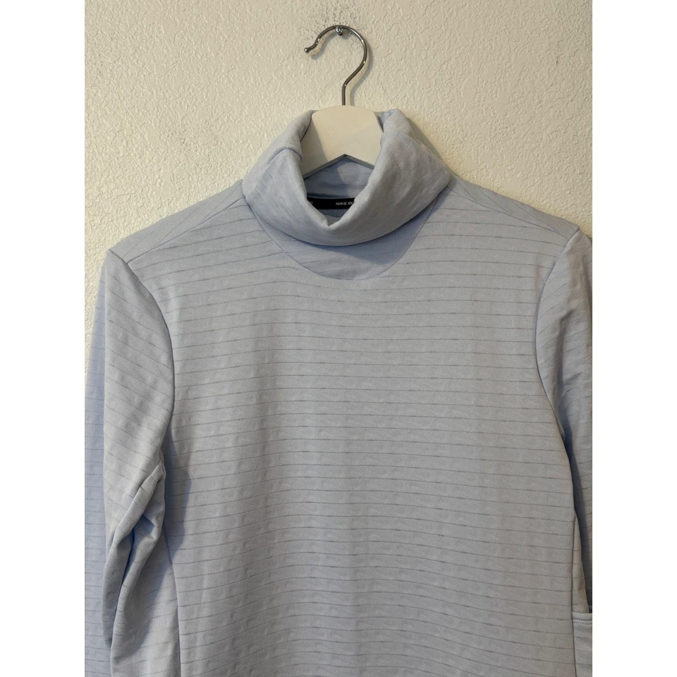 Camiseta para correr Nike Therma Fit azul claro cuello alto manga larga Foto 3 de 4