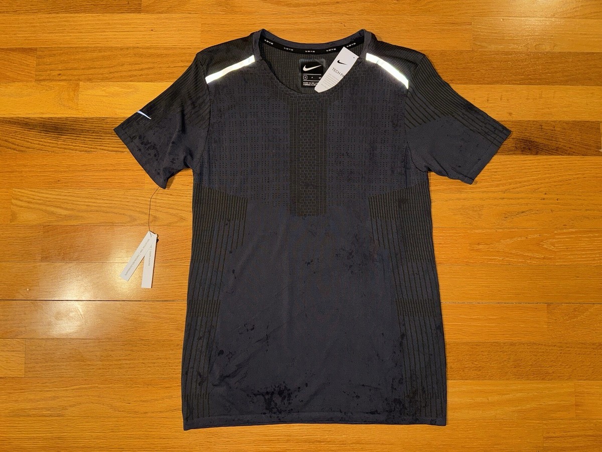 nike tech running top