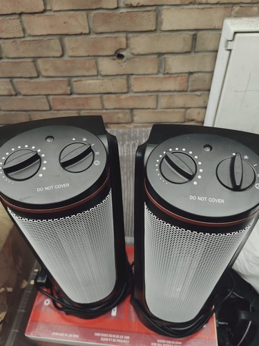 Four electric tower fan heaters - two fixed - two oscillating - only used once