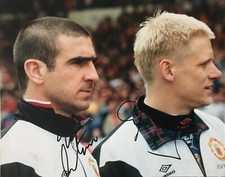 Eric Cantona & Peter Schmeichel signed Manchester United photo UACC AFTAL Eric Cantona & Peter Schmeichel signed Manchester United photo UACC AFTAL