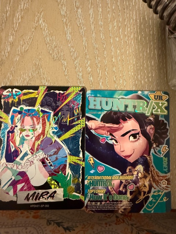 2026 Kayou KPop Demon Hunters UR-003 Zoey UR and Mira SP KPDH01-SP-002 Rare card