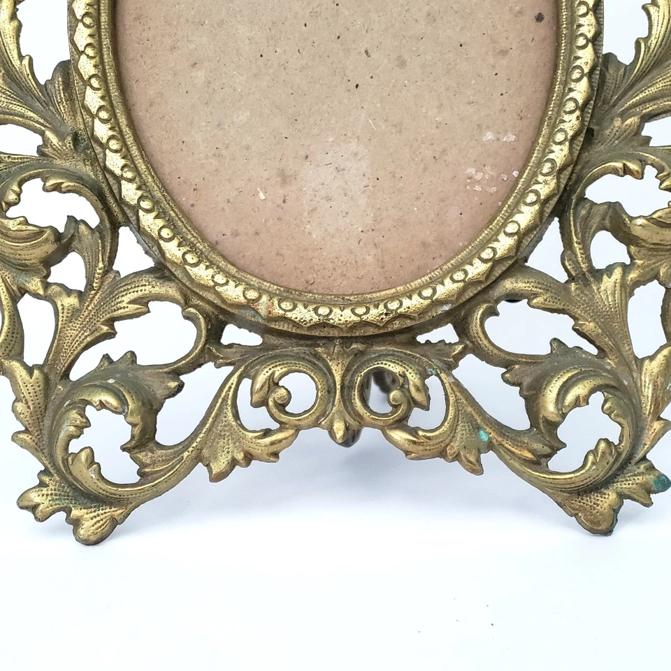 Marco de latón ovalado ornamentado vintage plegable soporte trasero estilo rococó Foto 3 de 4