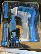 Mini Computer vacuum with attachments. Has light and new batteries